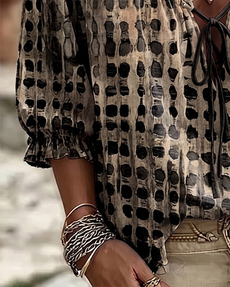 Cornelia | Blouse met stippen en veters