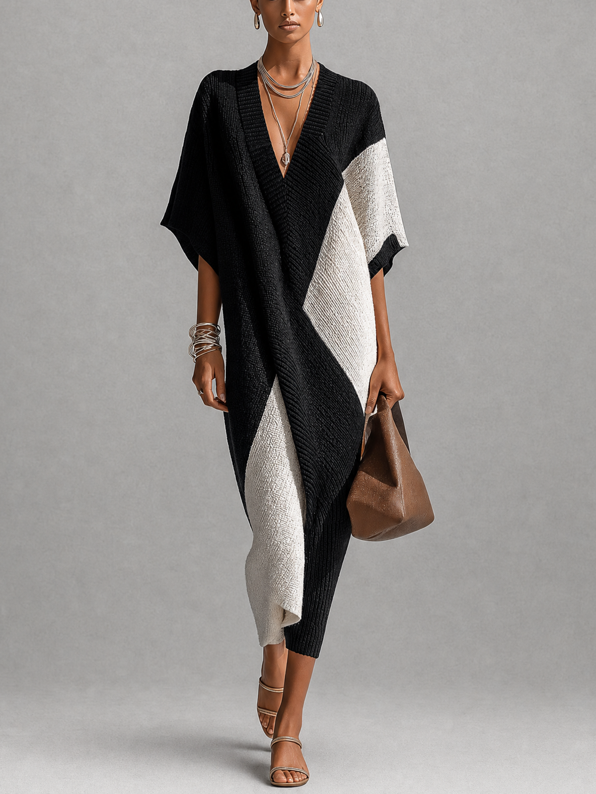 Mare™ | Zwart-wit getextureerde kleurblok midi-jurk met V-hals