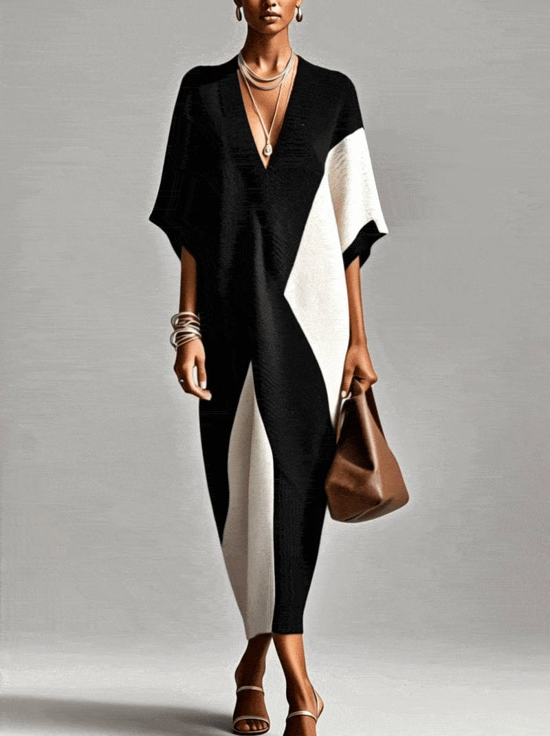 Mare™ | Zwart-wit getextureerde kleurblok midi-jurk met V-hals