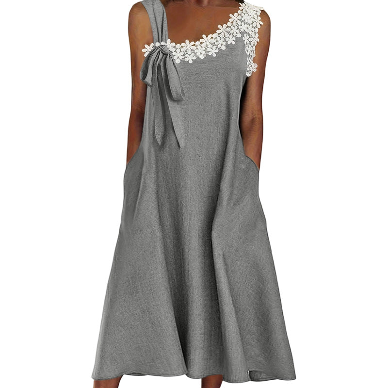 Bellami™ | Zomerfavoriet Elegante kanten jurk met strikdetail op de schouder