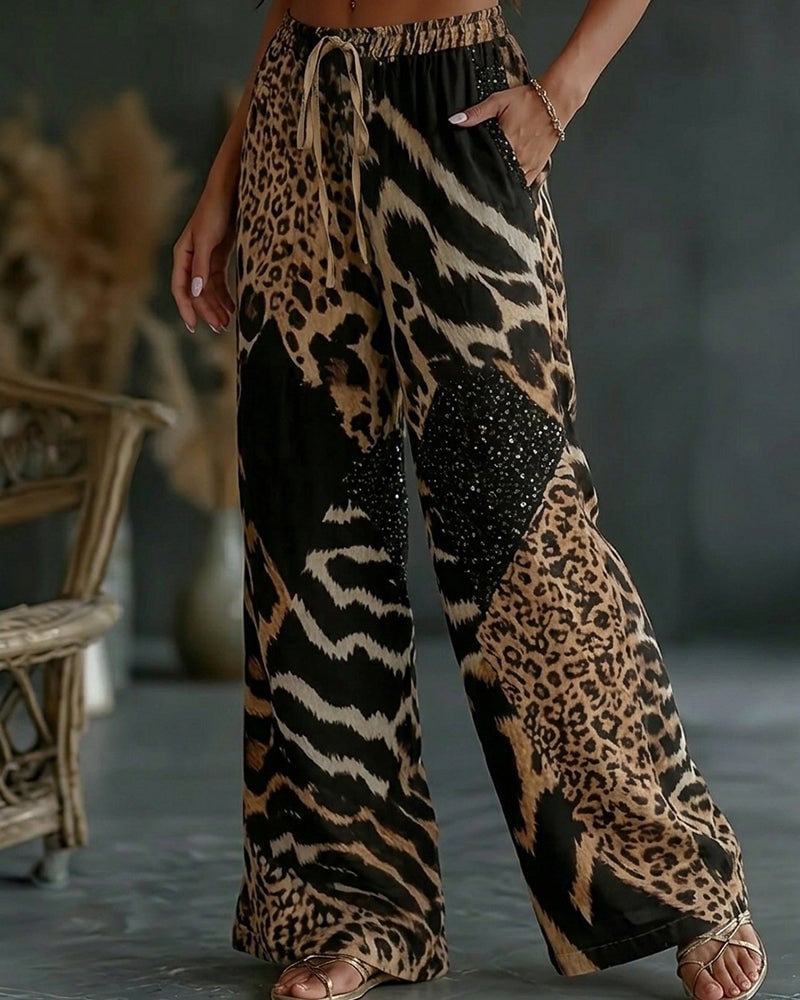 Isa | Broek met luipaardprint, patchwork, wijde pijpen, casual