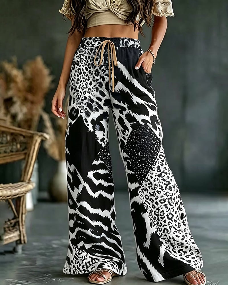 Isa | Broek met luipaardprint, patchwork, wijde pijpen, casual