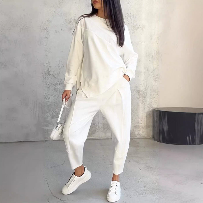Women's long-sleeve sweatshirt with an asymmetrical hem and a matching set with pants