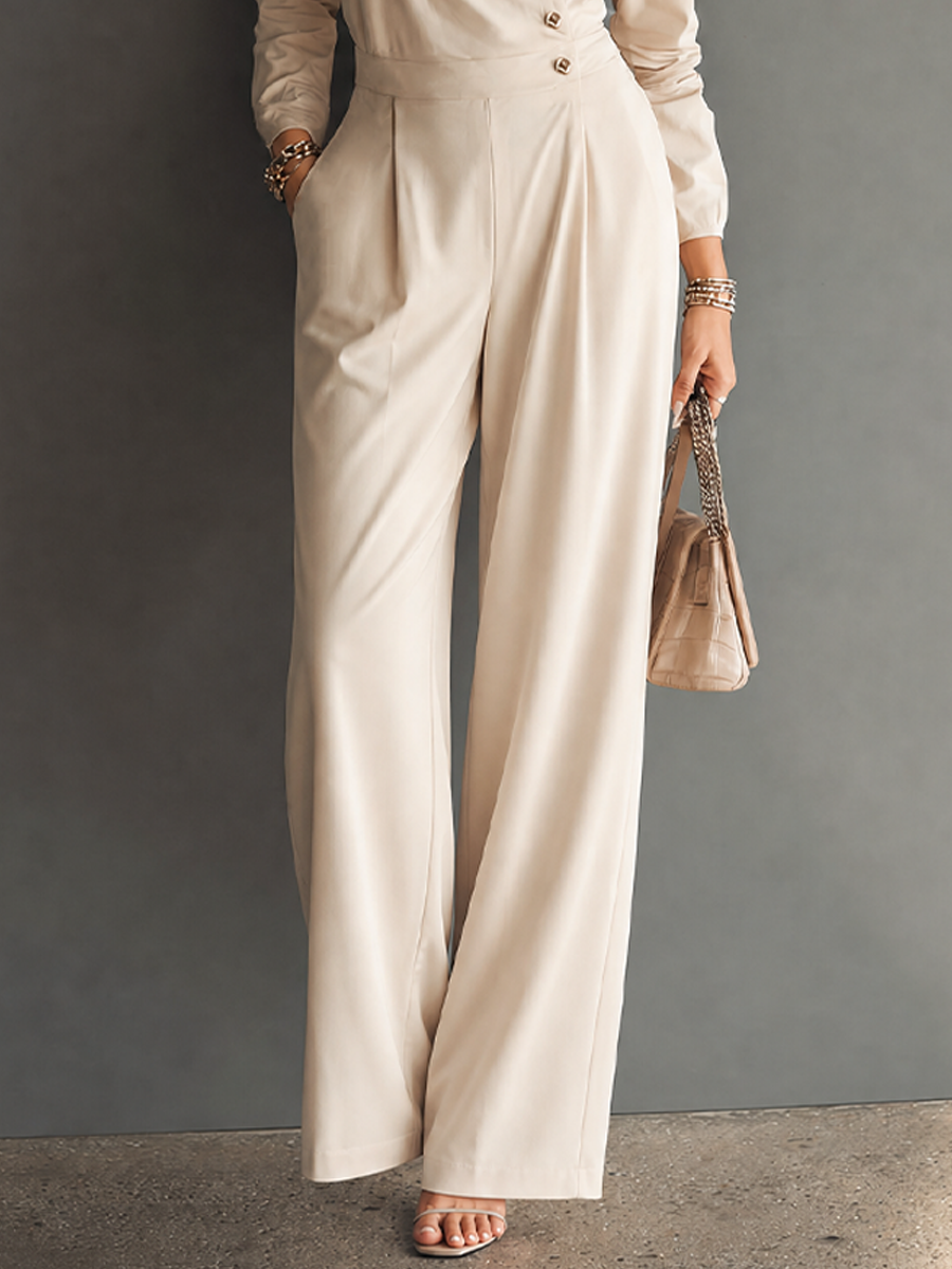 Veline™ | Minimalistische jumpsuit met lange mouwen, hoge taille en wijde pijpen