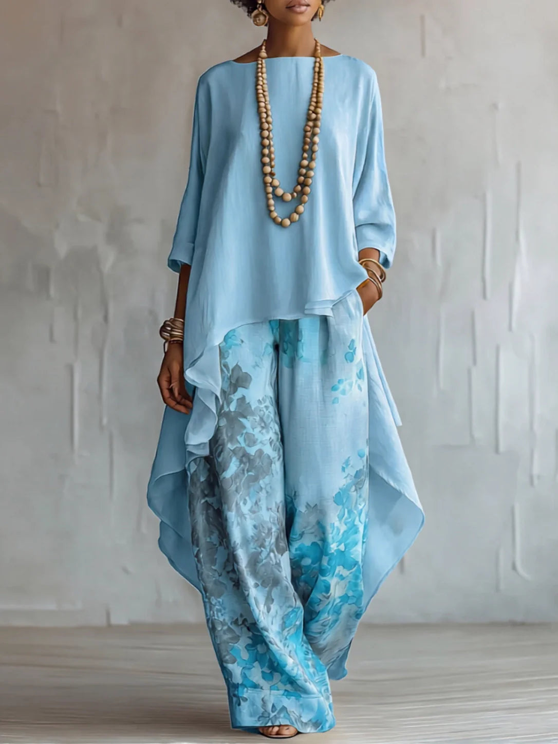 Ginevra | Asymmetrisch, soepelvallend pak met bloemenprint