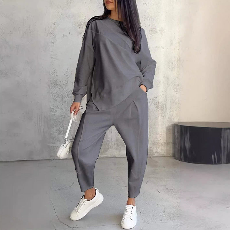 Women's long-sleeve sweatshirt with an asymmetrical hem and a matching set with pants