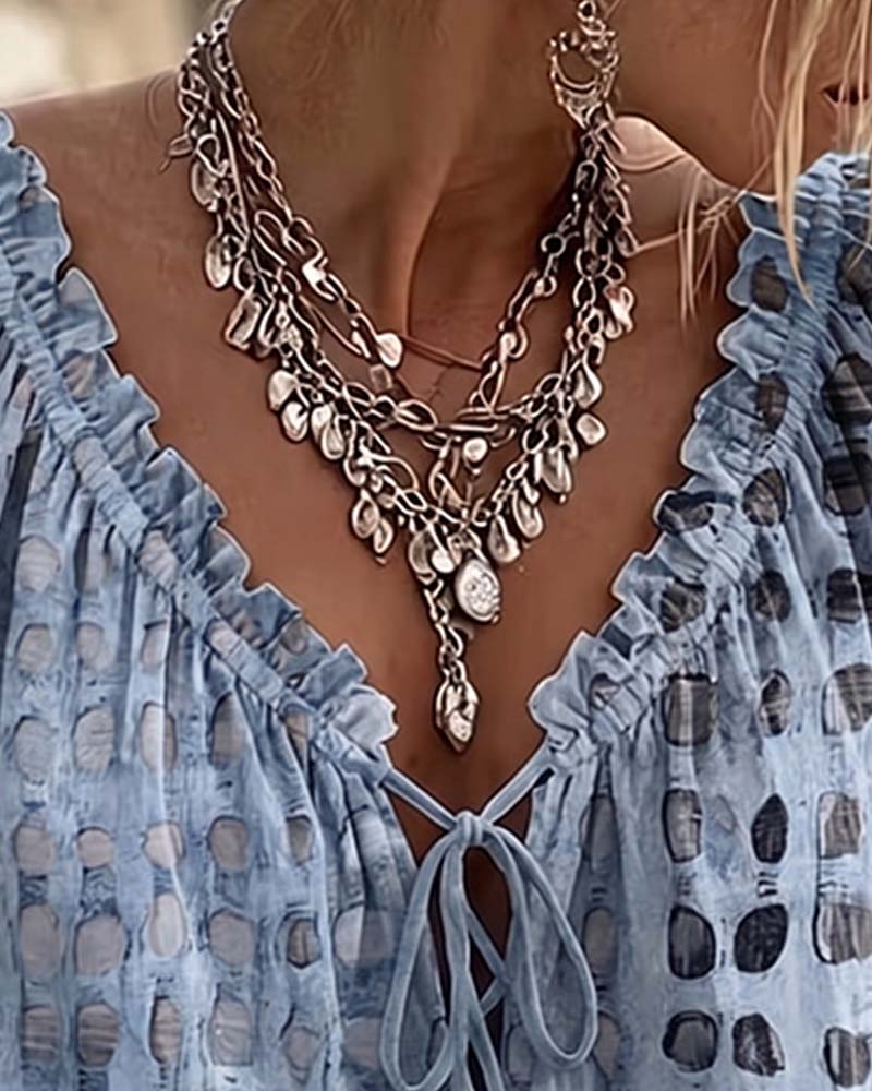 Cornelia | Blouse met stippen en veters