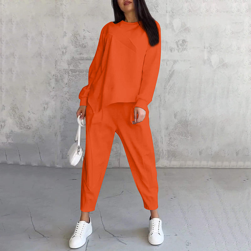 Women's long-sleeve sweatshirt with an asymmetrical hem and a matching set with pants
