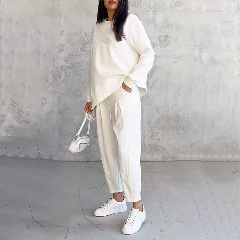Women's long-sleeve sweatshirt with an asymmetrical hem and a matching set with pants