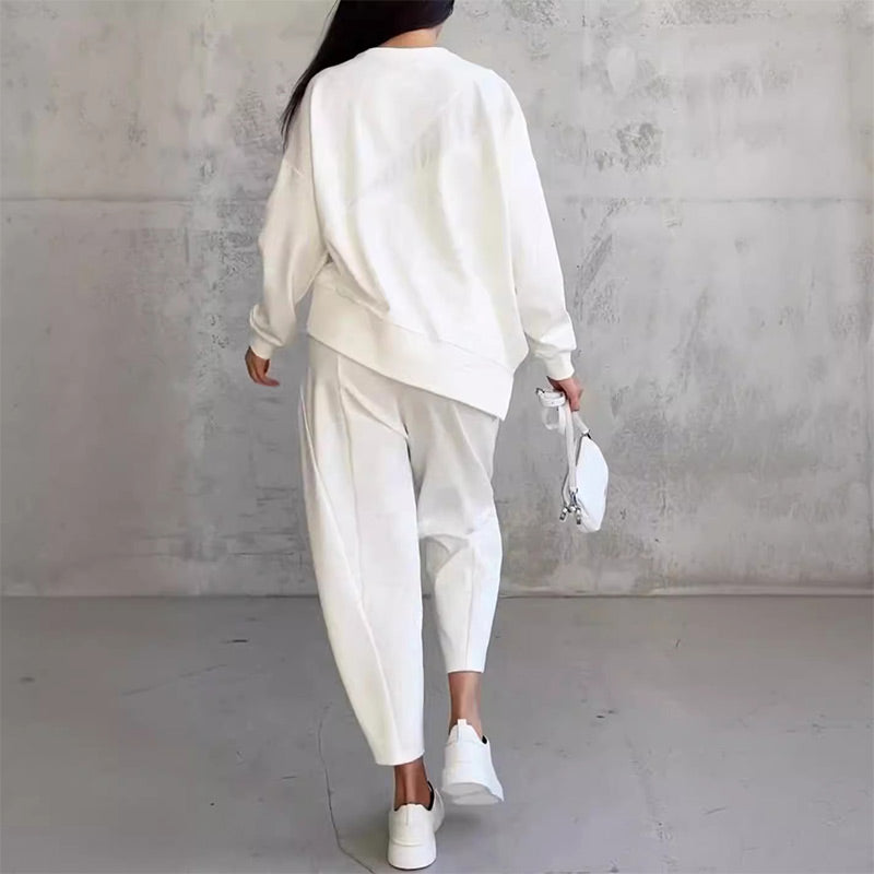 Women's long-sleeve sweatshirt with an asymmetrical hem and a matching set with pants