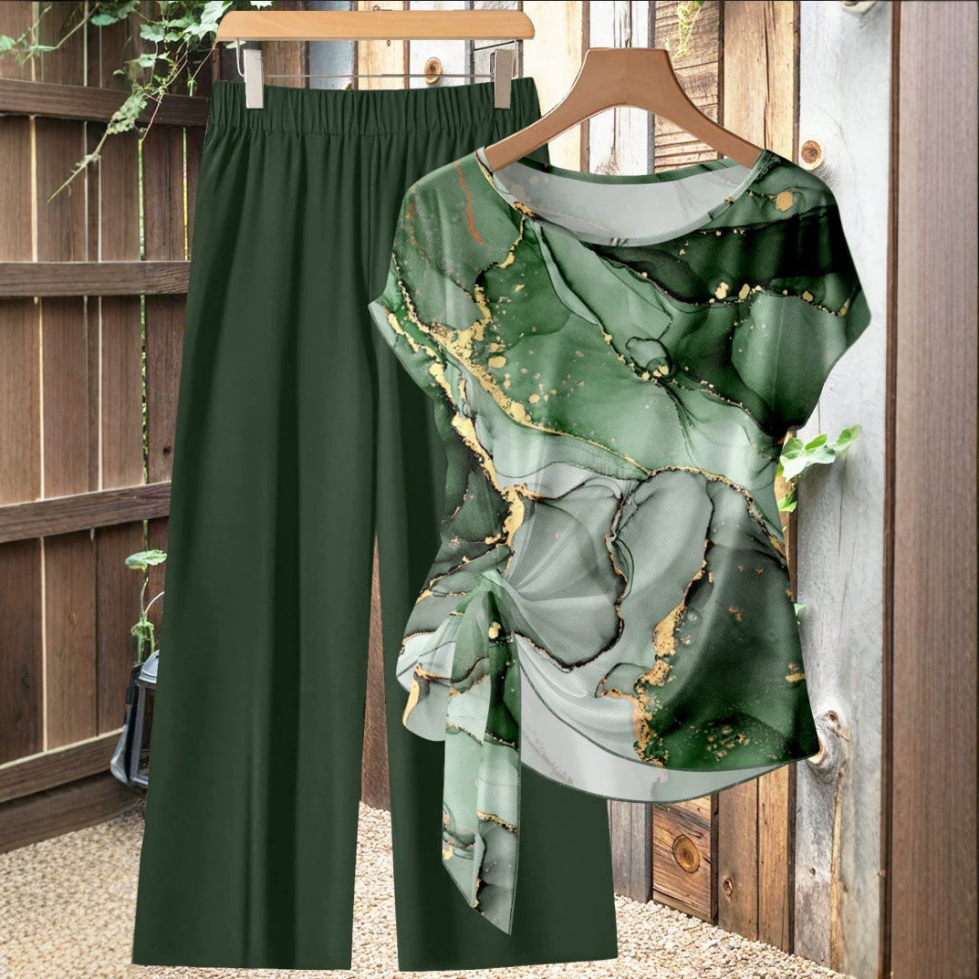 Noraya™ | Set bestaande uit een top met korte mouwen en knoop aan de voorkant en een broek met wijde pijpen