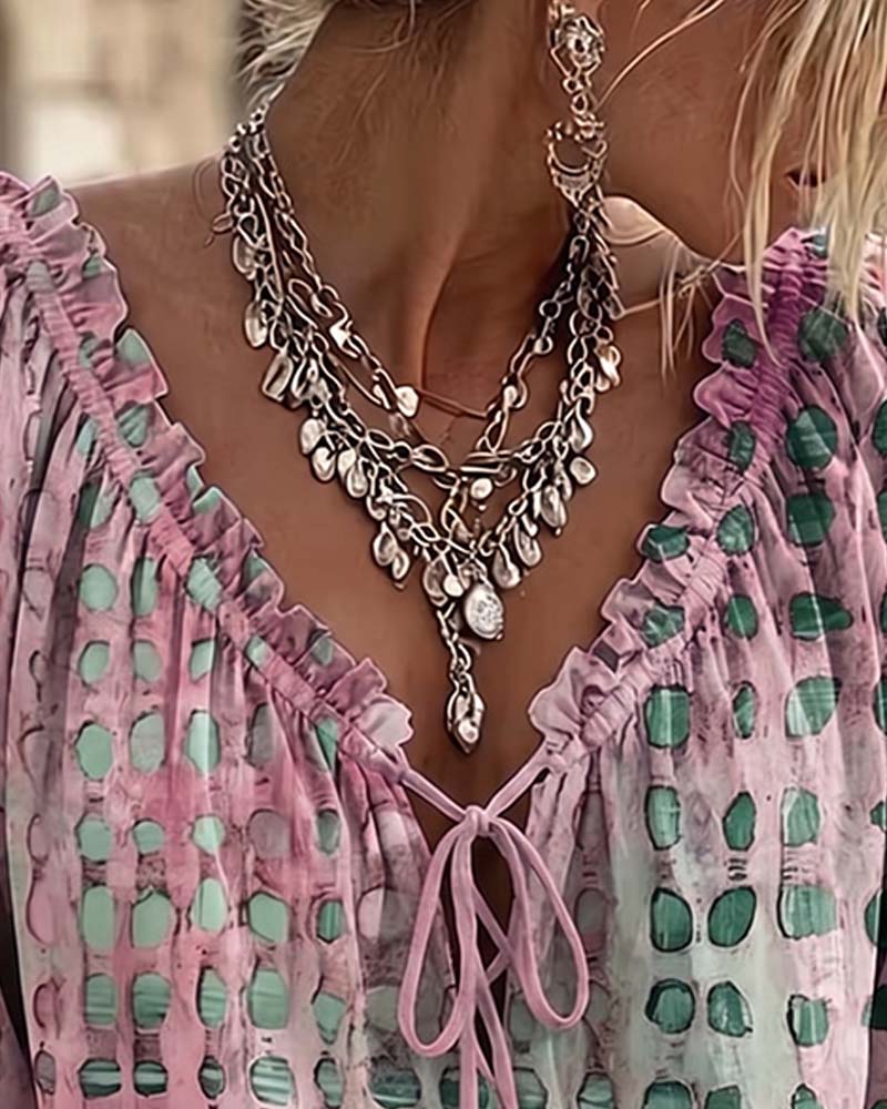 Cornelia | Blouse met stippen en veters