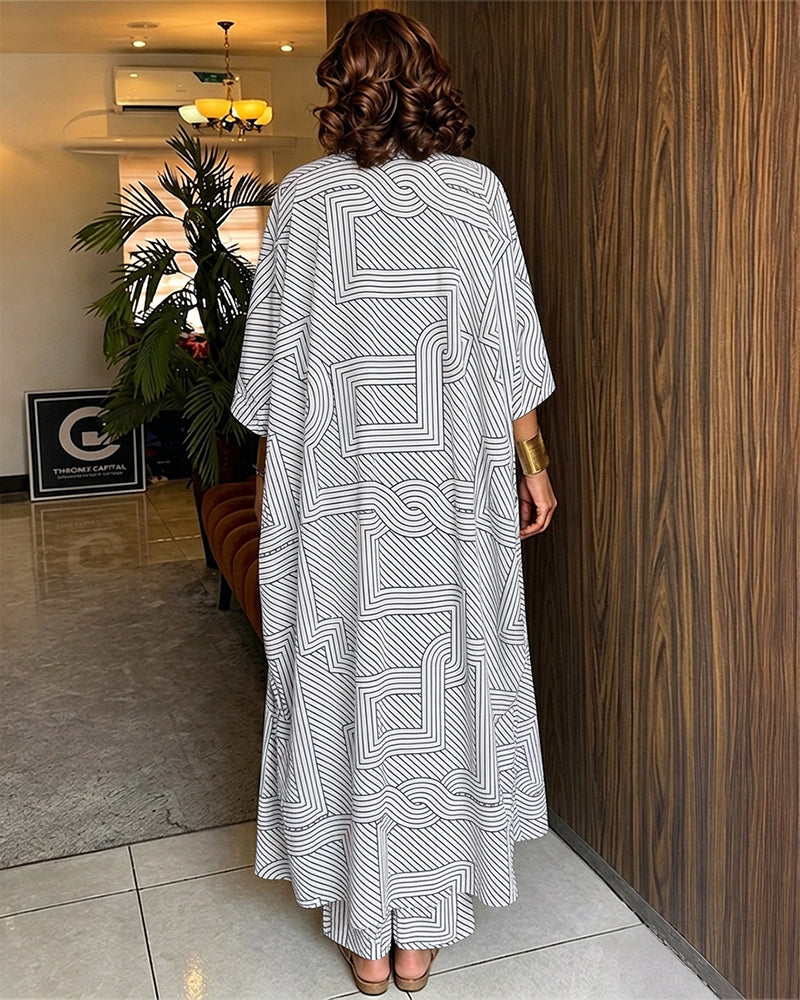Alira™ | Tweedelige set met geometrische print: loszittende, lange jas met vleermuismouwen en broek met hoge taille en wijde pijpen
