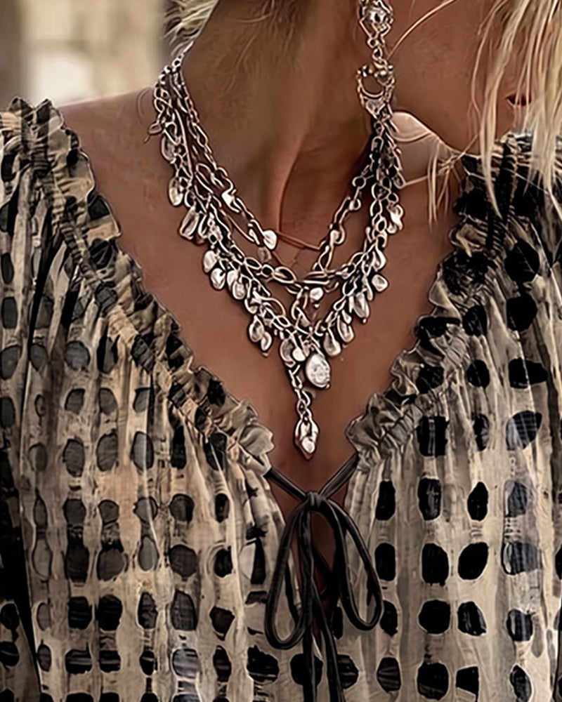 Cornelia | Blouse met stippen en veters