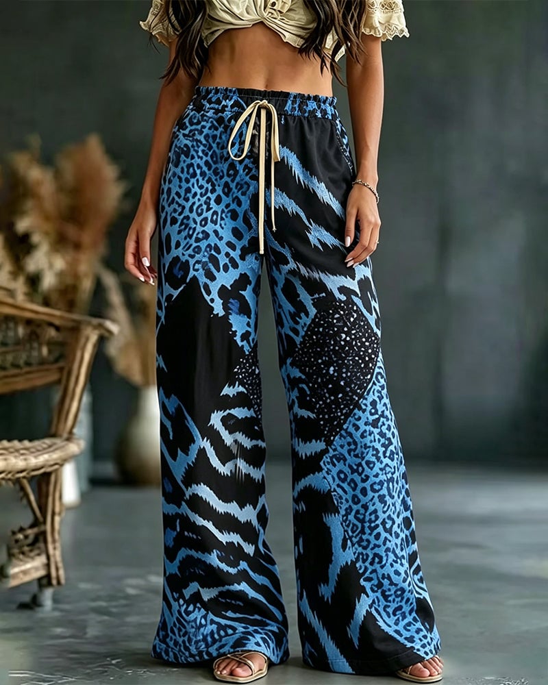 Isa | Broek met luipaardprint, patchwork, wijde pijpen, casual