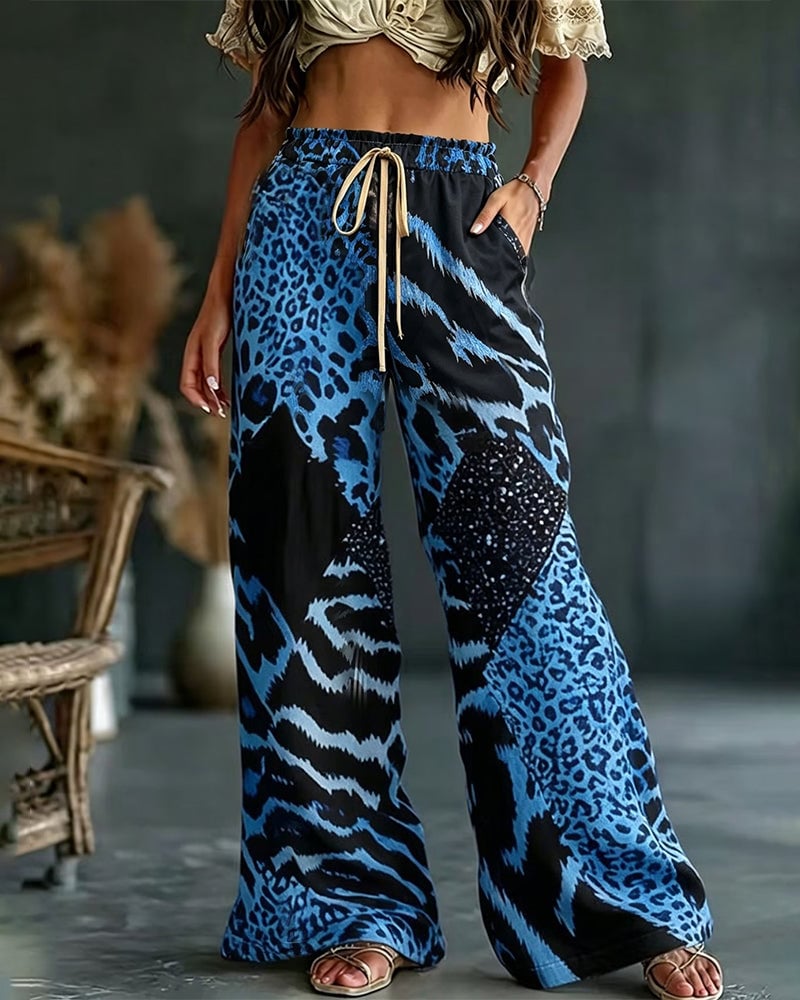 Isa | Broek met luipaardprint, patchwork, wijde pijpen, casual