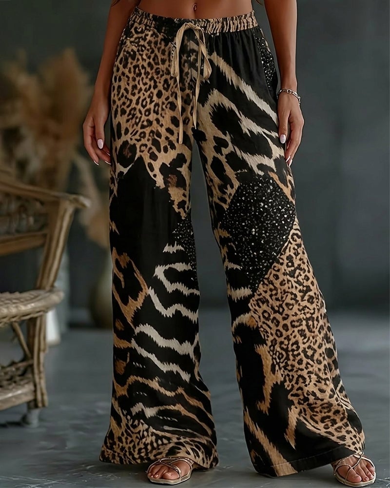 Isa | Broek met luipaardprint, patchwork, wijde pijpen, casual