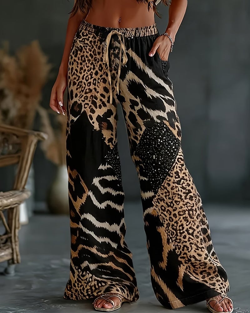 Isa | Broek met luipaardprint, patchwork, wijde pijpen, casual